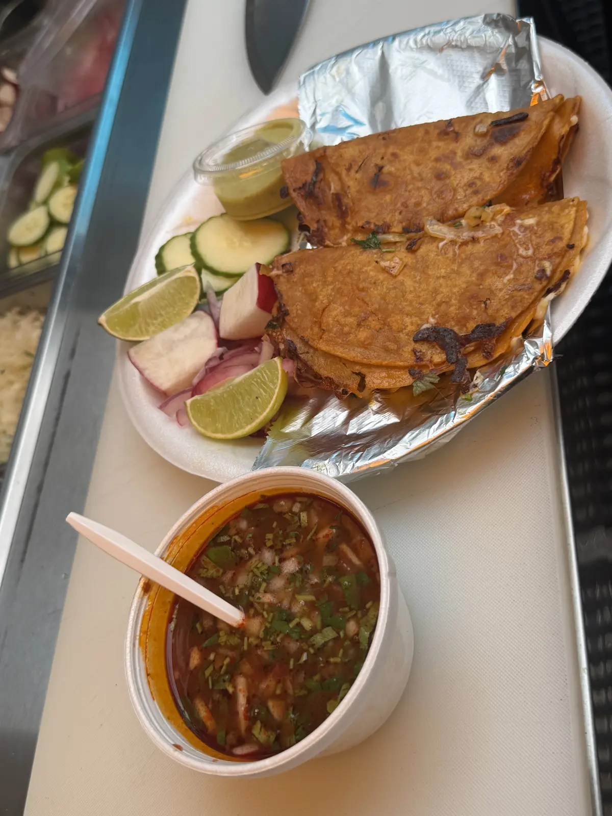 Taco Fiesta birria tacos with consom&eacute;