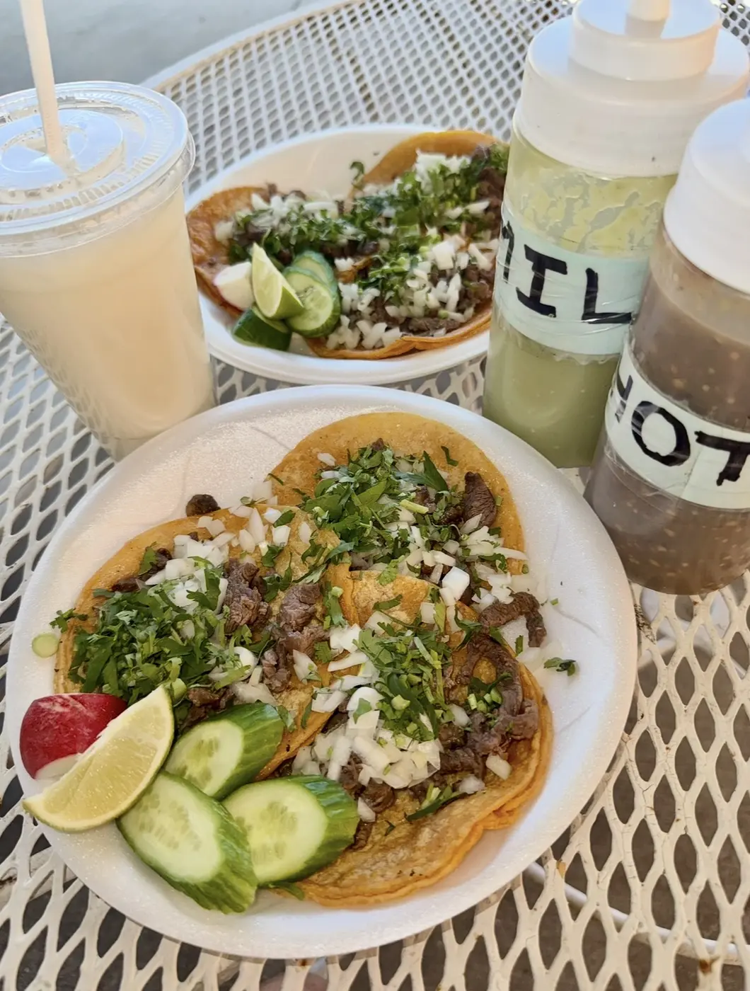 Fresh street tacos with cilantro, onion, lime and horchata